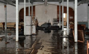 Over 5 feet of water flooded the basement of St. Francis of Assisi Church in Naugatuck in August leaving the basement muddy and destroyed. –FILE PHOTO 
