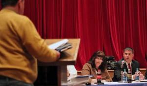 Naugatuck Mayor Robert Mezzo, right, and Board of Finance Chairman Diane Scinto respond to a question from John Dibiaso during a public hearing on the budget Monday night in the auditorium of City Hill Middle School. –ELIO GUGLIOTTI 