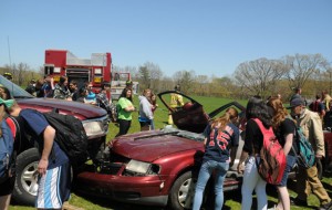 A mock crash was held at Woodland Regional High School in Beacon Falls May 3 in anticipation of tonight’s senior prom. The mock crash was put on as part of Makenzie White’s senior project. During the simulation members of Beacon Hose Company No. 1 and the police department arrived on the scene of a mock three-car crash on the soccer field and extracted students from the cars. White said she thought the mock crash was important because it showed the students that they are not as invincible as they think they are. –PHOTOS BY LUKE MARSHALL 