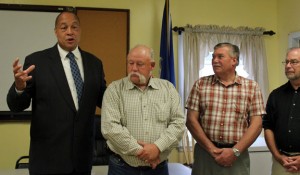Beacon Falls Republican First Selectman Gerard Smith, left, talks about Republican Selectman David D’Amico, second from the right, who will not seek re-election Saturday at the Beacon Falls Senior Center. Beacon Falls Town Clerk Leonard Greene Sr. and Town Treasurer Mike Krenesky look on. –ELIO GUGLIOTTI 