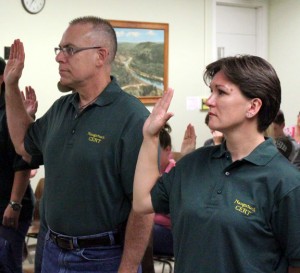 Robert Smith, left, and Suzanna Sedenszki are sworn in as members of Naugatuck’s Community Emergency Response Team Monday night in Town Hall. In total, 19 new members of the volunteer group were sworn in during the ceremony. –ELIO GUGLIOTTI 