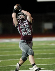 Naugatuck's Tom Douty (26) pulls down a pass for a first down during the game Nov. 1 versus Wilby at Naugatuck High School. The Greyhounds won the game, 42-14. –RA ARCHIVE 