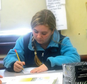 Hillside Intermediate School sixth-grader Jordyn Hunt takes a math quiz Jan. 13 at the school in Naugatuck. Over the past four years, Hillside has risen from being labeled a failing school under the federal No Child Left Behind act to the top performing school in the district. –LUKE MARSHALL