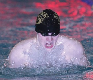 Woodland's Aidan Music swims the 100 breaststroke during the NVL swim finals at Kennedy High School March 7. Music won the event with a time of 1:04:28. -REPUBLICAN-AMERICAN  