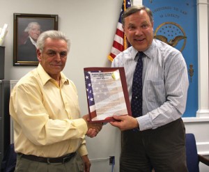 Beacon Falls First Selectman Christopher Bielik, right, presents former Selectman Dominic Sorrentino with a certificate of recognition Nov. 9 for his years of public service. –LUKE MARSHALL 