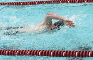 Naugatuck’s Brian Goggin competes in the 200 yard freestyle Feb. 9 against Sacred Heart at Naugatuck High School. The Greyhounds won the meet, 102-84, for their first victory over Sacred Heart in five seasons. –LUKE MARSHALL