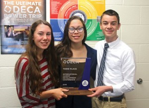 Naugatuck High School juniors Kelly Murphy, left, and Peter Morrissey, right, won third place in a recent international DECA competition. They are pictured with NHS DECA Chapter President Alexus Coney. –LUKE MARSHALL 
