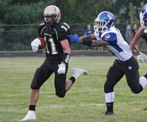 Woodland junior running back Tom Smith (11), who has 485 yards rushing and four touchdowns on the ground this year, and the Hawks will look to run over Seymour on Thanksgiving eve. –ELIO GUGLIOTTI